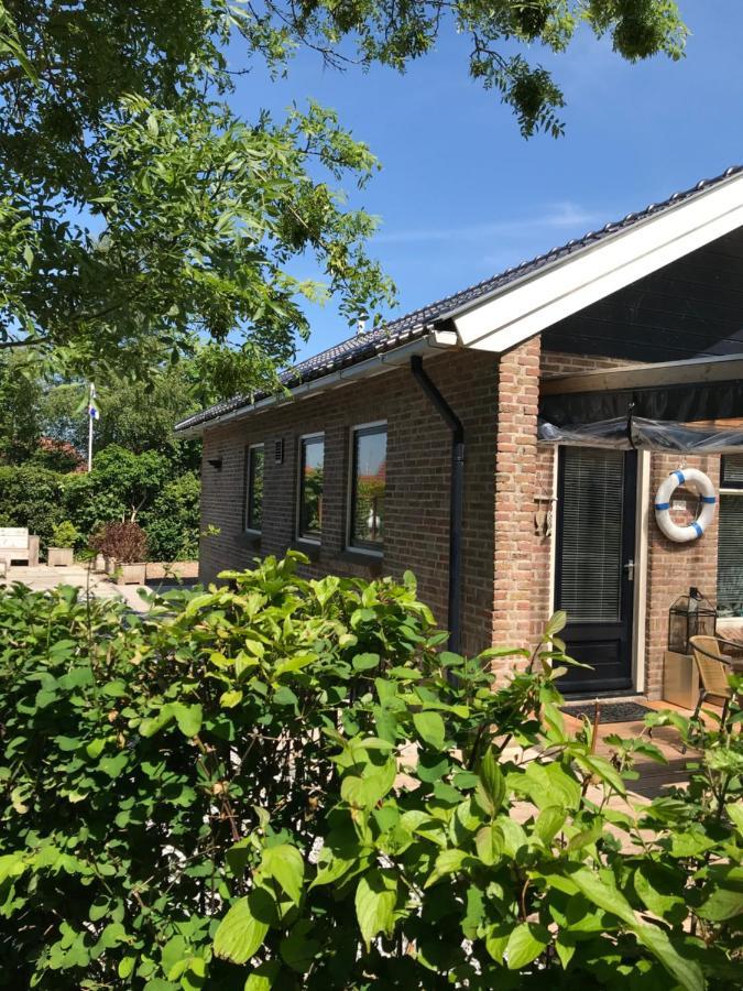 Bellemare Bungalow Lauwersmeer Mit Ueberdachte Veranda Und Eingezaeuntem Garten Anjum Экстерьер фото